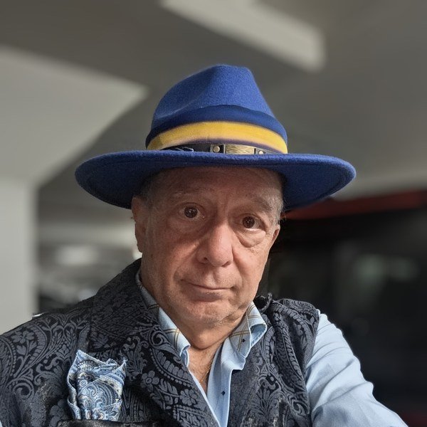 Tony Lawand in a blue hat