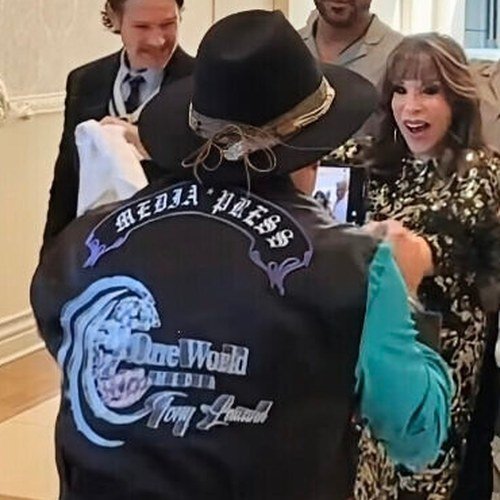 Tony Lawand with his One World Media jacket