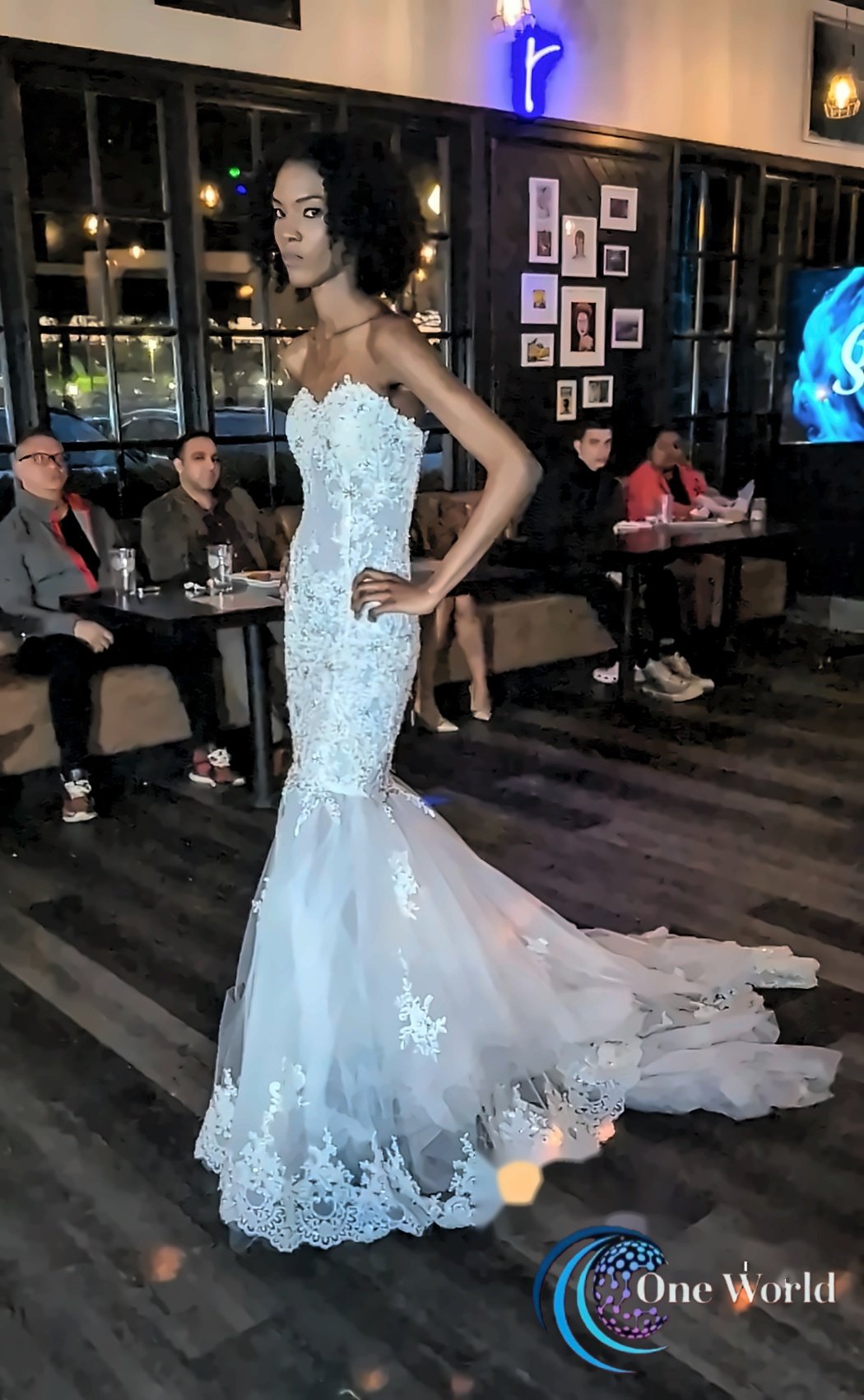 White gown with train on the runway, fashion photography by Tony Lawand